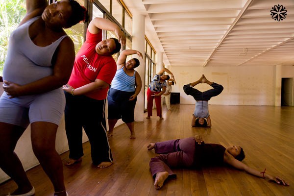 Plus size women stretching, getting ready to dance