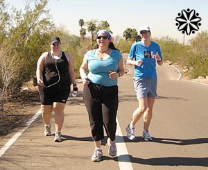 Plus size women walking, training at a camp in Arizona